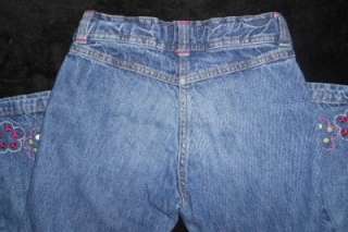   GYMBOREE MEDIUM WASH JEANS WITH FLOWERS ON CUFF ADJUSTABLE WAIS  