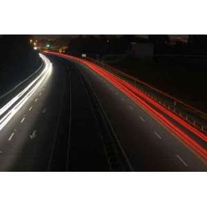  Road with Car Traffic at Night and Blurry Lights Showing 