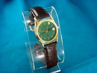 VINTAGE LADIES HOLE IN ONE SWISS GOLF ACTION WATCH  
