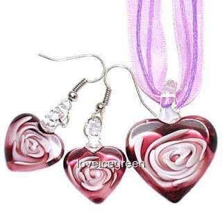   and earrings beautiful purple heart with swirling flower in the