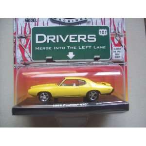    M2 Machines Drivers 101 R2 Yellow 69 Pontiac GTO Toys & Games