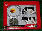 BRITAINS FARMYARD PACK OF RING FEEDER, HAY BALE AND 2 COWS